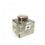 A large silver mounted square block glass inkwell, John Grinsell & Sons, marks rubbed, circa 1910,