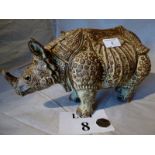 An Audrey Carter pottery rhino (piece of horn missing) est: £40-£60 (A1)