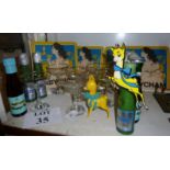 A collection of Babycham items to include set of six glasses, bottles, candles,