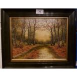 A framed and glazed embroidered picture woodland scene est: £25- £50 (AM)