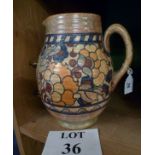 A decorative Charlotte Rhead jug est: £25-£40 (B12)