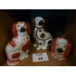 Three Staffordshire dog figures (one is a tobacco jar) est: £30-£50 (B36)