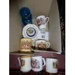 A box of Coronation items, mugs, saucers,
