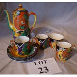A decorative coffee pot with four matching cups and saucers est: £20-£40 (A3)