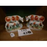 A pair of Staffordshire cow groups est: £25-£45 (B24)