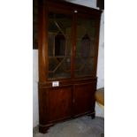 A 19c mahogany corner display cabinet wi