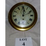 An antique Edwardian ship's clock with k