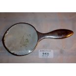 A magnifying glass (chipped) est: £50-£7