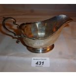 A silver pedestal sauce boat Birmingham