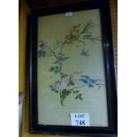 A framed glazed tapestry study of birds