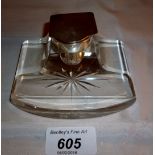 A glass inkwell with star base and silve