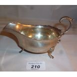 A Mappin & Webb silver sauce boat with d