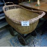 A 19c child's wicker pram on wooden base