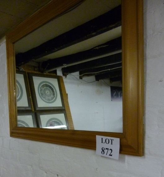 A 20c oblong pine framed wall mirror est