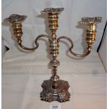 A silver three branch candelabrum (appro