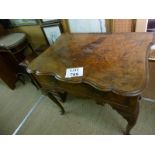 An 18c walnut lowboy with a single drawe