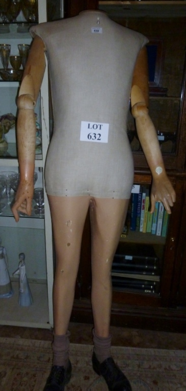 An old wooden mannequin est: £80-£120