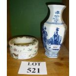 A blue and white Chinese vase and a ring