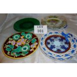 A collection of five ribbon plates and t