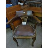 A 1930's oak desk chair in excellent con