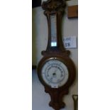 A carved oak wheel barometer et: £30-£50 (C)