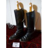 A pair of black leather riding boots with wooden trees est: £25-£45 (BB36)