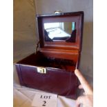 An attractive purple leather lady's vanity case with mirror and attached with Liberty's of  London