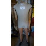 An old wooden mannequin est: £70-£90