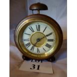 An oak cased alarm clock est: £20-£30