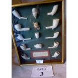 A framed and glazed collection of Victorian clay pipes est: £40-£60 (A2)