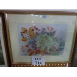 A framed and glazed watercolour still life study of wild flowers signed indistinctly lower left