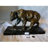 A 20c bronze of a bear on a marble base est: £300-£400 (K2)