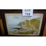 A framed and glazed watercolour study of figures walking along a coastal path and with boats at sea