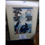 A framed and glazed Japanese print depicting a man in a mountainous landscape signed & bearing