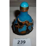 A Chinese blue snuff bottle overlaid wit