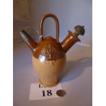 A Doulton stone ware wine pourer est: £2