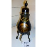 A decorative black tole ware and gilt de