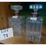 Two silver collared Whisky decanters (a/