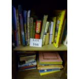 A collection of assorted books and album