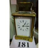 A brass carriage clock est: £30-£50 (O3)