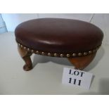 A leather covered footstool est: £25-£45