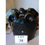 A cased set of binoculars est: £20-£40 (