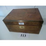 A brass bound oak writing box with engra