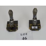 A pair of Art Deco style chrome bird and black marble book ends,