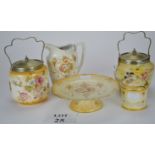 Two Crown Devon biscuit barrels;