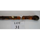 A Japanese carved bamboo cane with root ball handle,