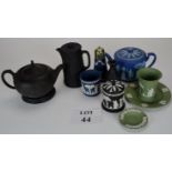 A collection of Wedgwood black basalt and Jasperware items to include teapots, vases,