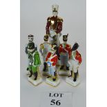 A set of six porcelain soldiers in historical uniforms to include Dragoon Guard and Grenadier