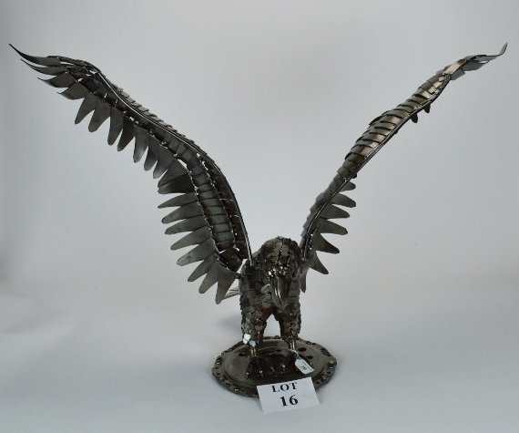 An unusual recycled-metalwork Studio model of an eagle the wings outstretched 90cm wide approx est: