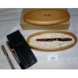 A Stipula Etruria 625 fountain pen boxed and a brass inkwell with flower decoration est: £100-£200